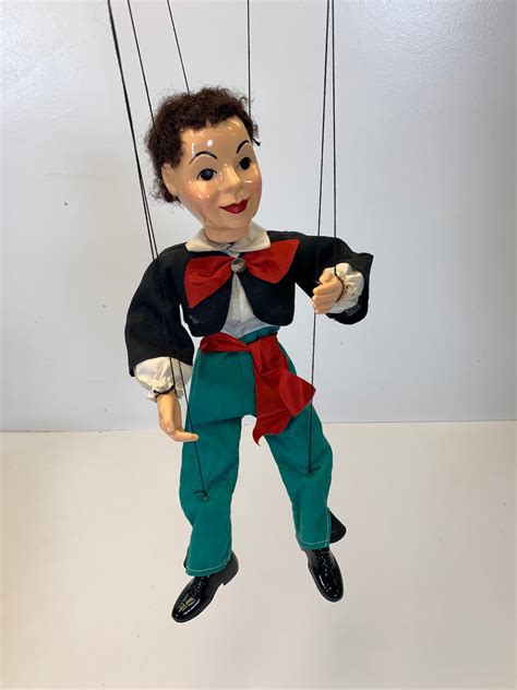 puppet and marionette|marionettes or string puppets.